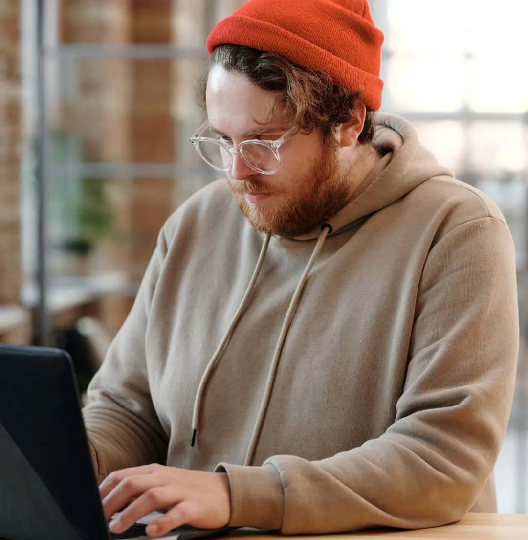 Hipster on laptop